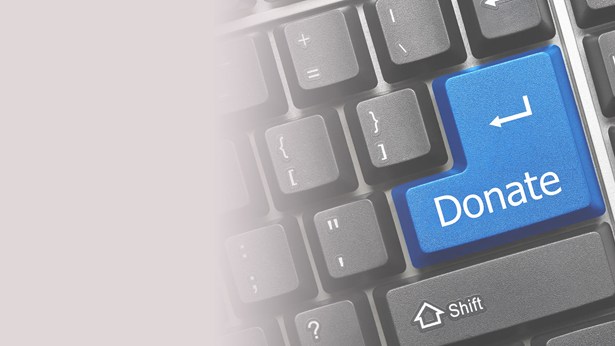 Computer keyboard with donate button