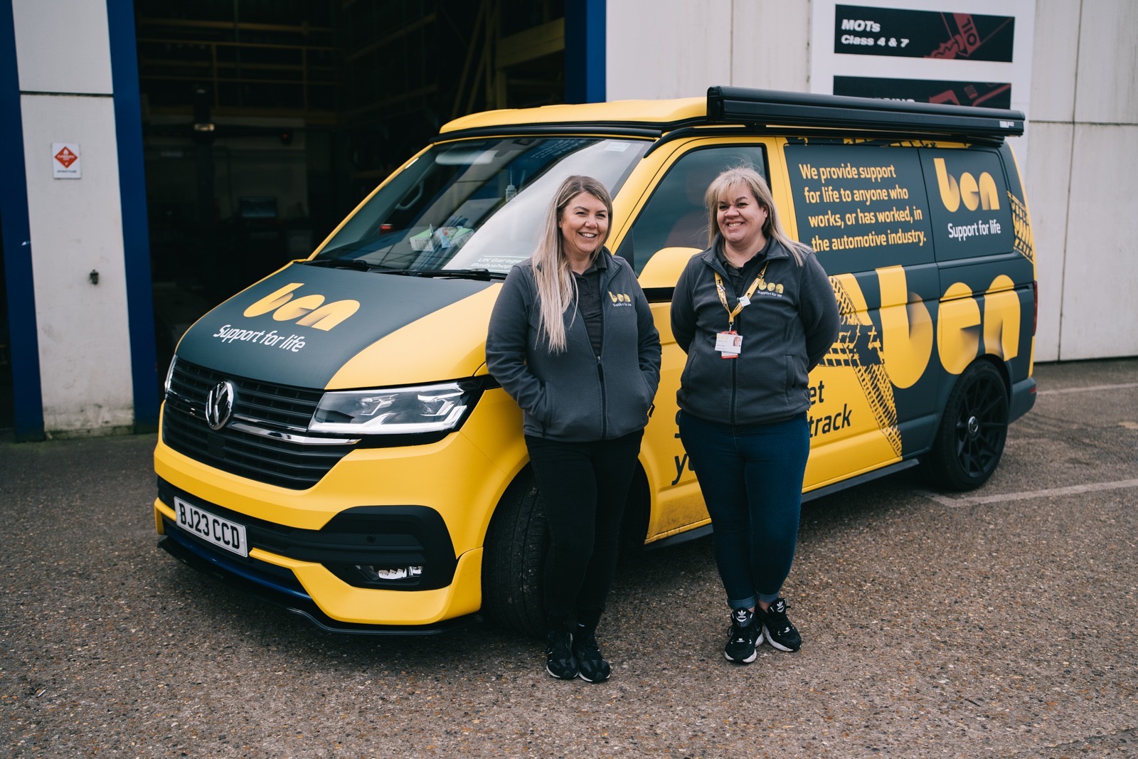 Ben on the road team with bus