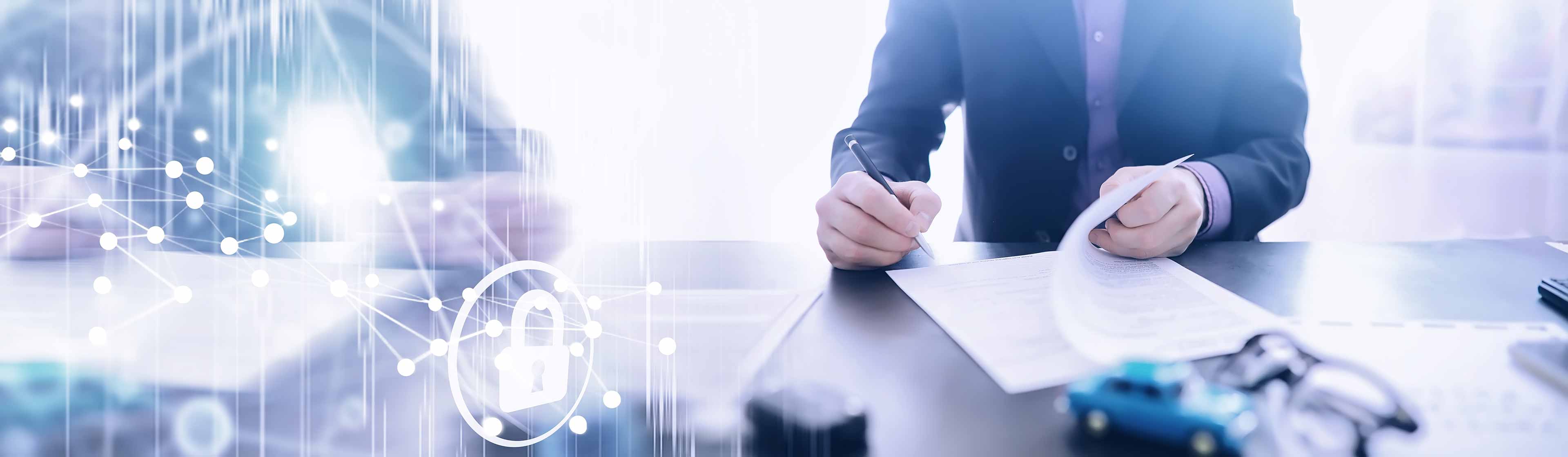 Man going through important documents on a desk